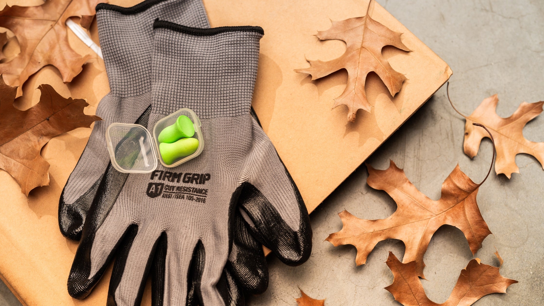 earplugs in case on work gloves