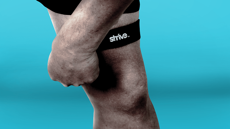 Use Strive's Patella Support Strap above knee
